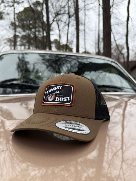 Tomahawk Jim's Tommy Dust trucker hat in brown and black