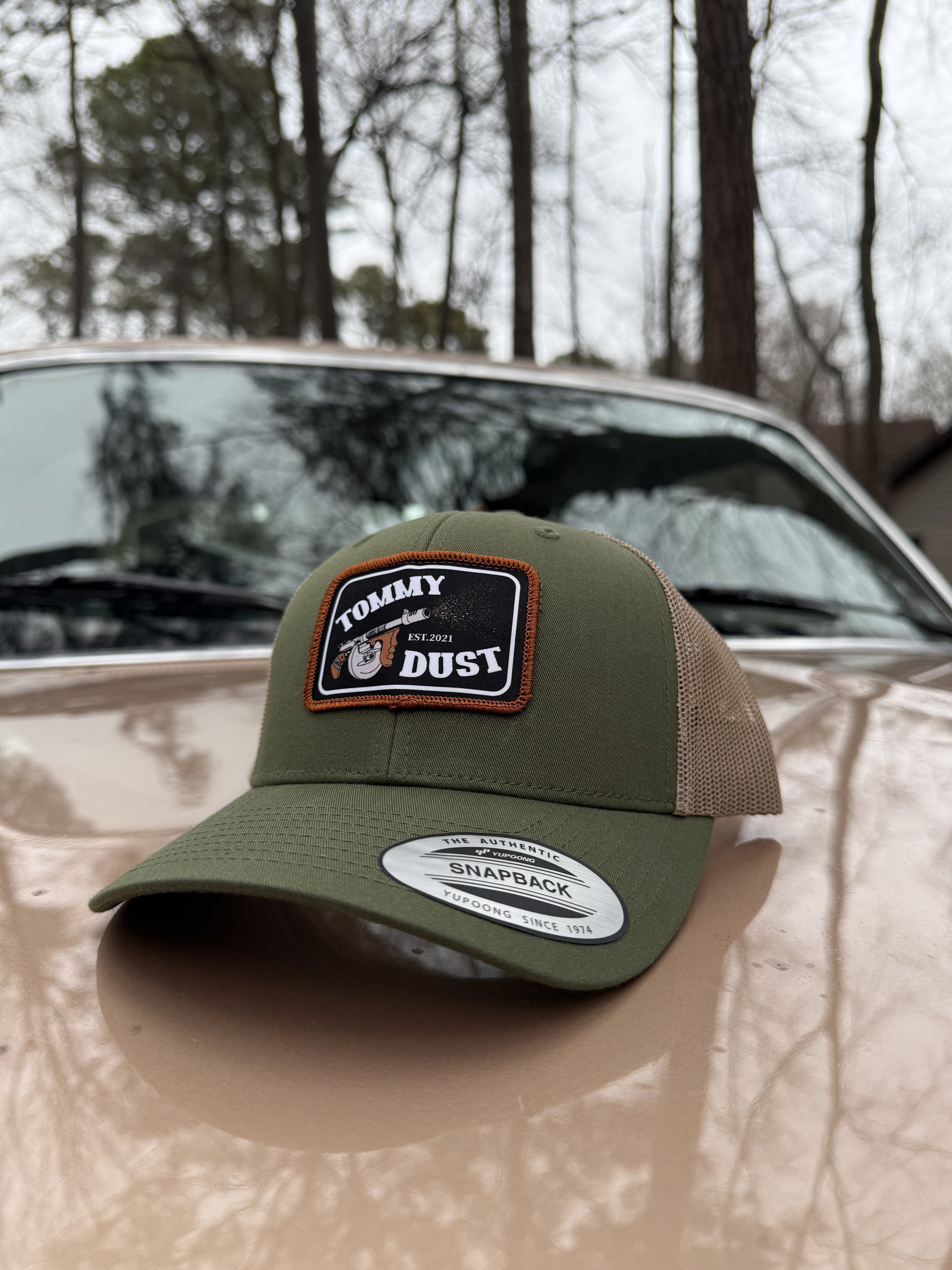 Tomahawk Jim's Tommy Dust trucker hat in olive khaki